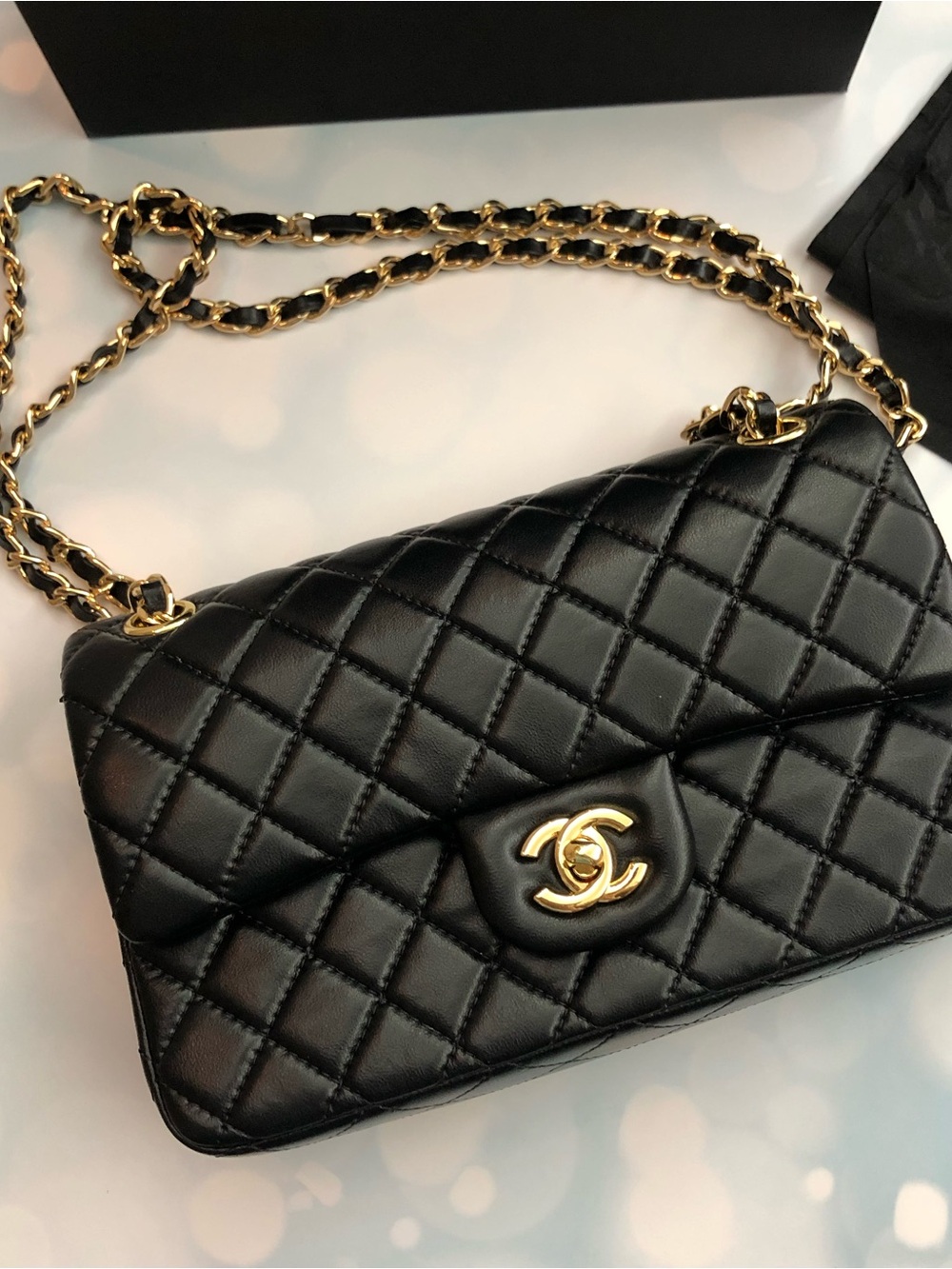 CHANEL Luxury Quilted Black Leather Shoulder Bag with Gold Chain